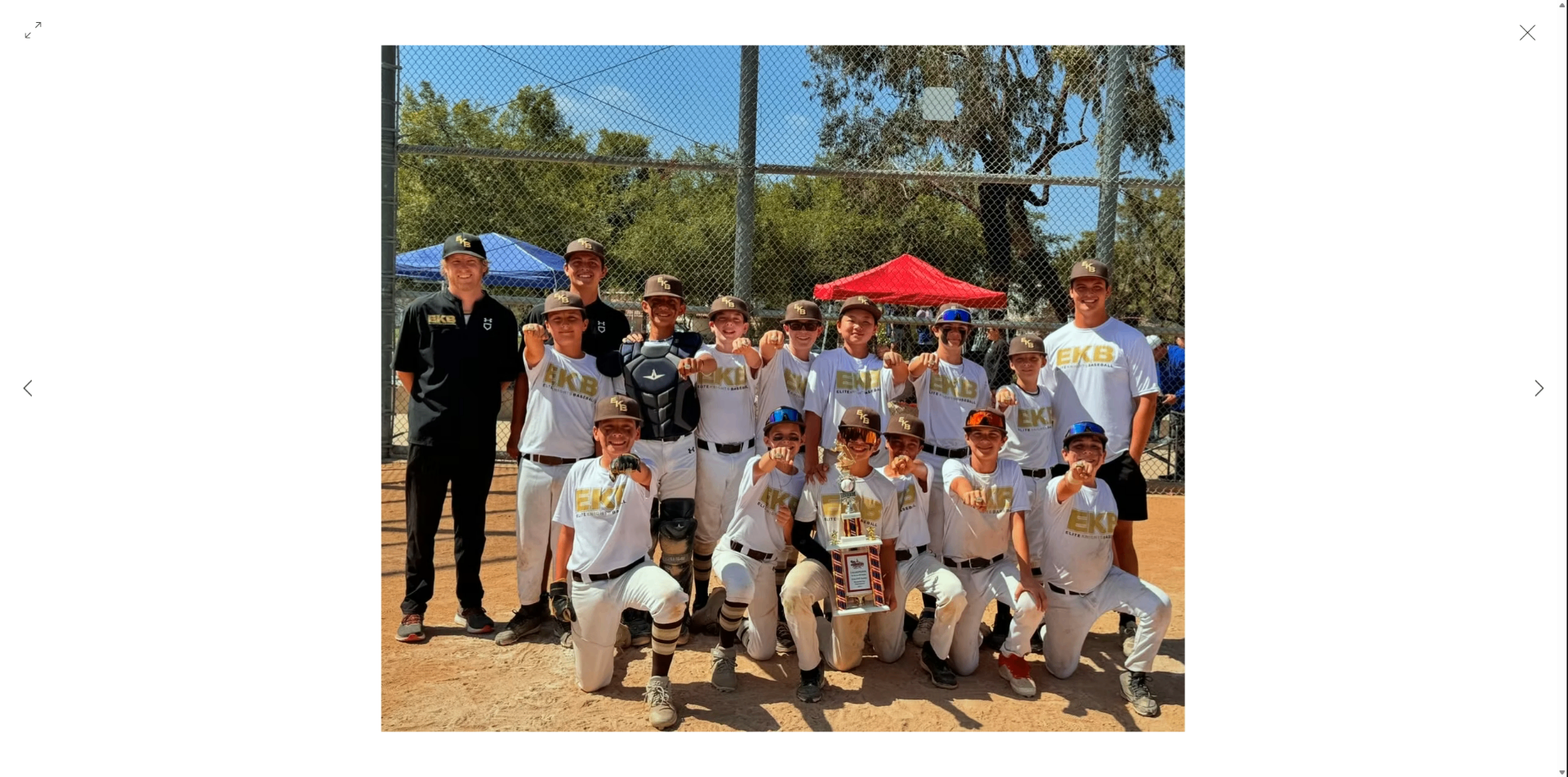 Elite Knights 12U Summer Slam Champions celebrating with trophy
